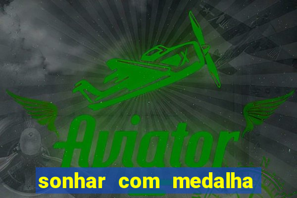 sonhar com medalha de santo